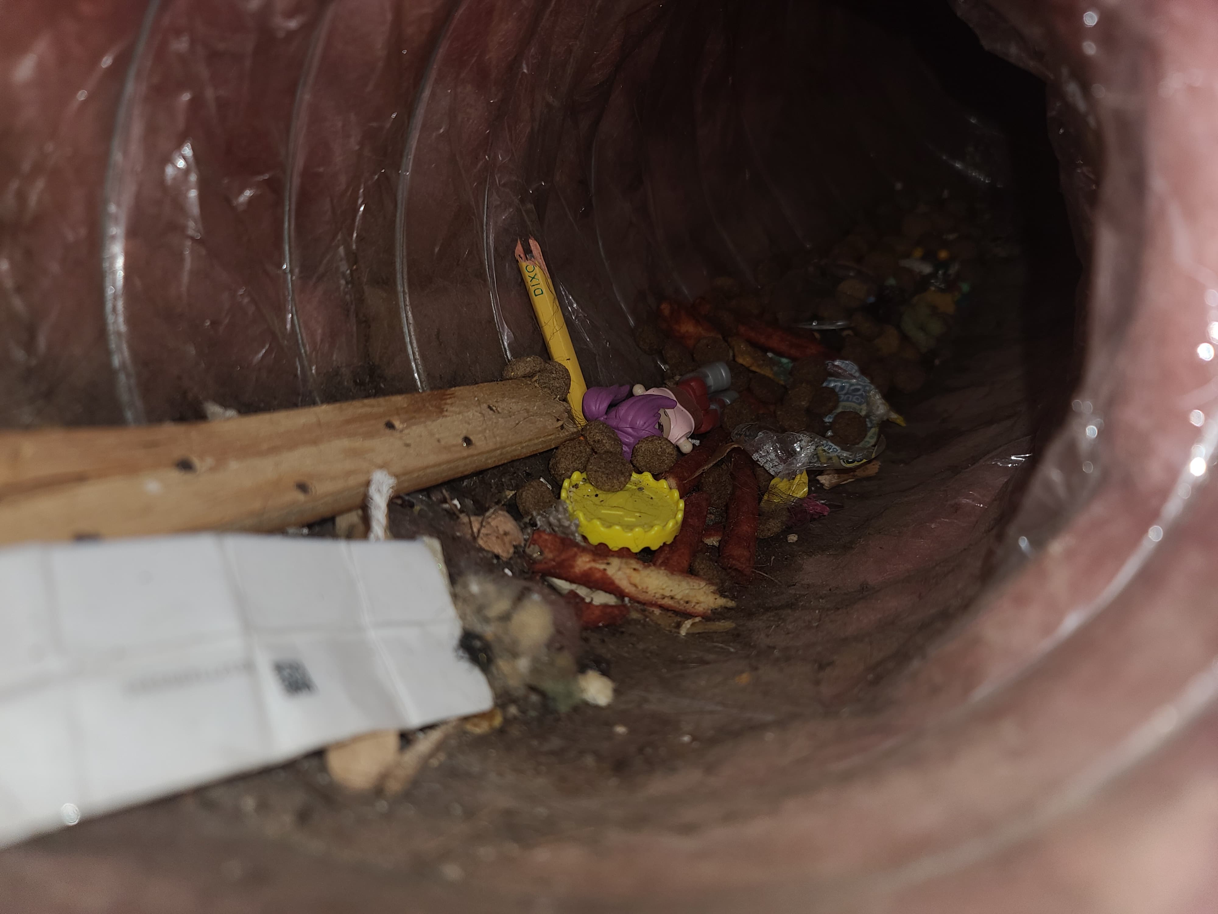 Small items and coins collected inside duct - Portland OR